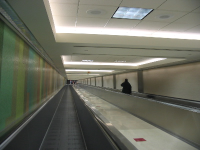 moving walkways at a dramatic angle in the los angeles international airport