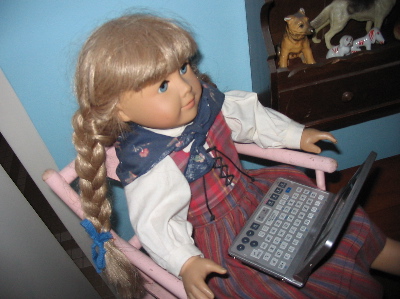 It's a perfectly sized laptop for my doll.