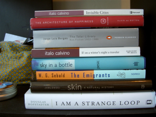 a stack of books, described below