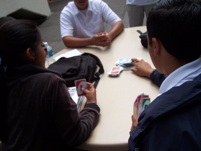 some people at my school, playing uno.