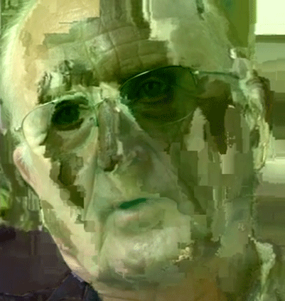 a guy with green on his face