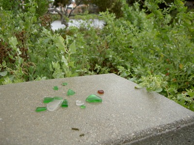 bits of sea glass on concrete