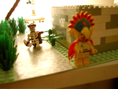 a lego skeleton and a guy with a weird hat