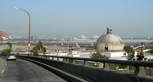 a view from the freeway of a strange round structure