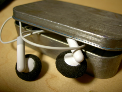 a sanded-down Altoids tin